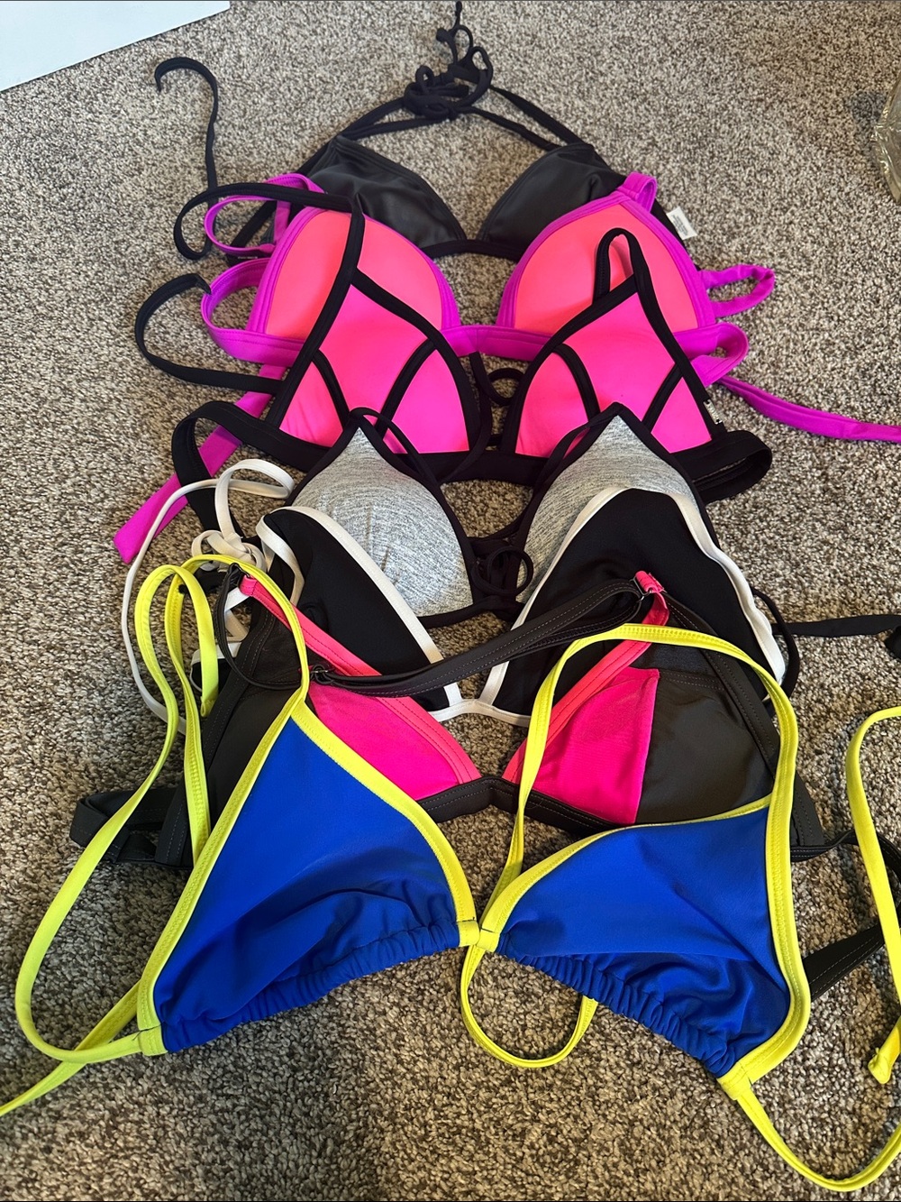 Stack of Neon & Black Triangle Bikini Tops